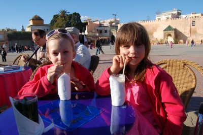 The girls enjoying their banana juice in the main square - a great place for sitting and just watching the world go by!